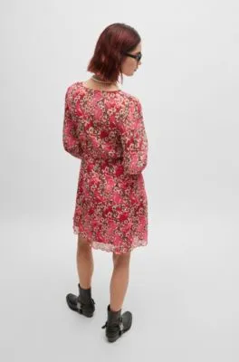 Plissé wrap dress in floral print with elasticised cuffs